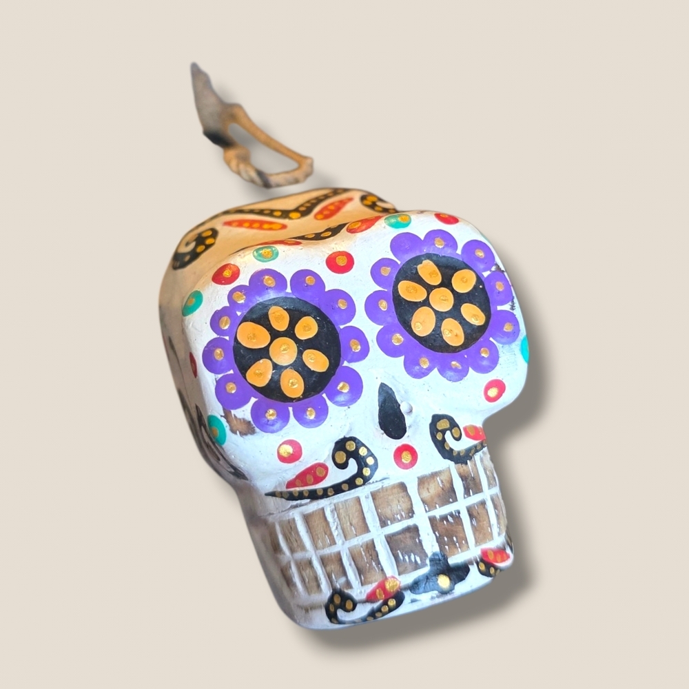 Hand-Painted White Sugar Skull Ornament with Purple Floral Eyes